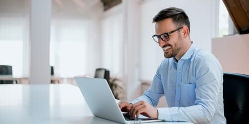 A man doing work in an office building wonders what you should do if you suspect an employee has a substance use issue