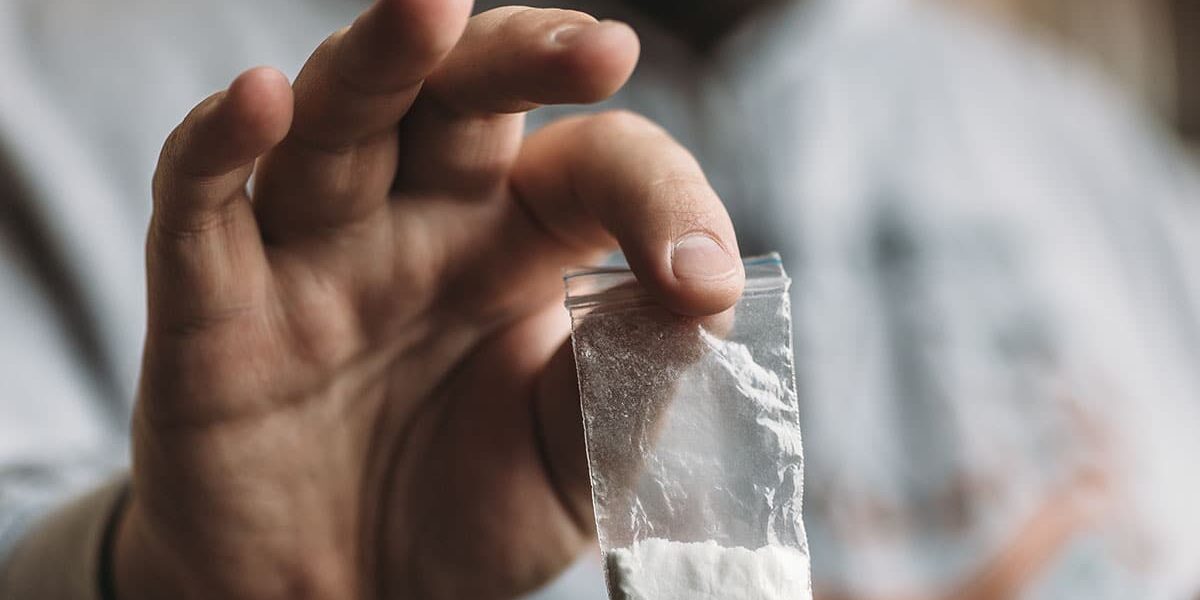 How long does cocaine last A man holds out a baggie of white powder and wonder how long does cocaine last in your system?