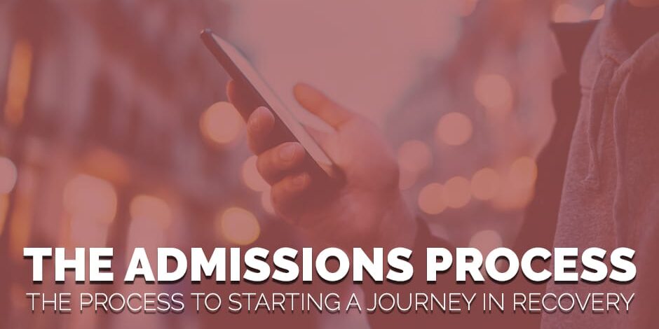 a person researches the recovery admissions process on his smartphone