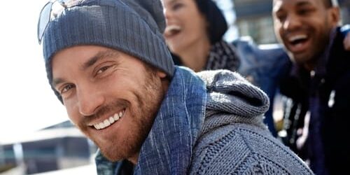 A man smiles after he and his friends learn how to stop a panic attack