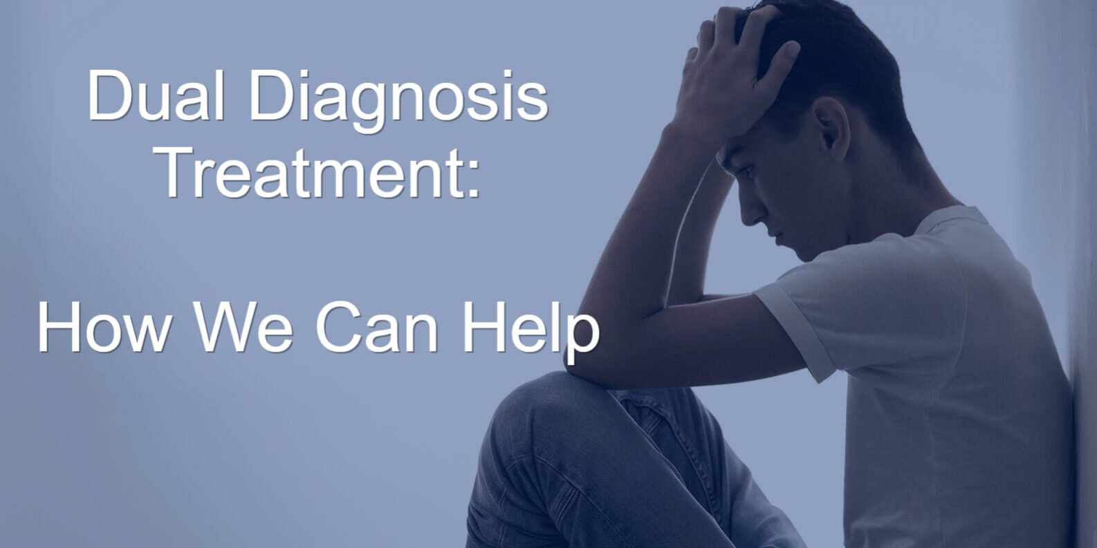 a man sits with his hands on his head and wonders about how dual diagnosis treatment can help him
