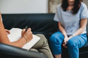 A woman and her therapist work on creating an individual therapy program at Recovery Ways