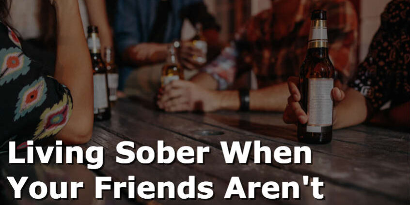 a group of people drink as a person wonders about living sober when your friends aren't