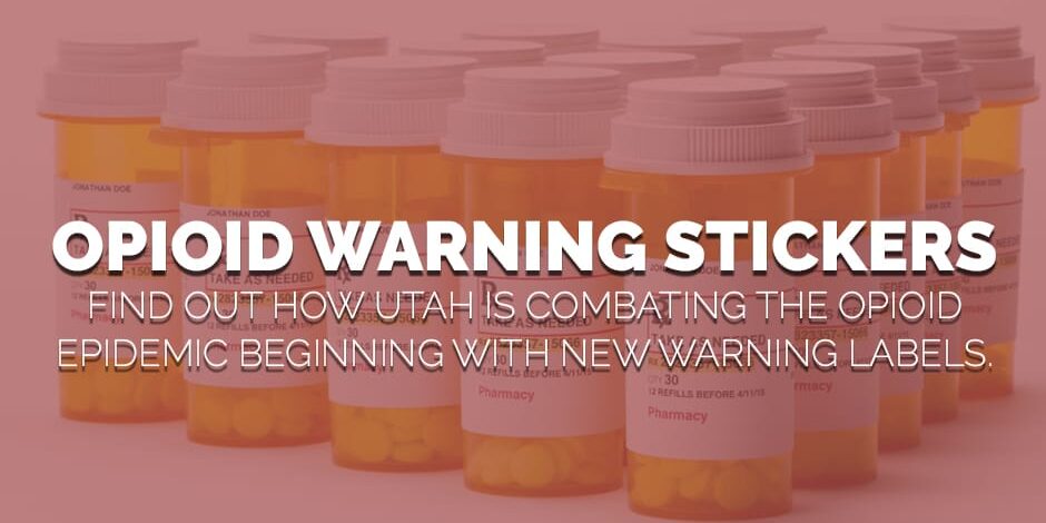 bottles of prescription pills have red opioid warning stickersinutah