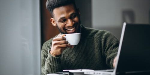 a man researches relapse warning signs on his laptop