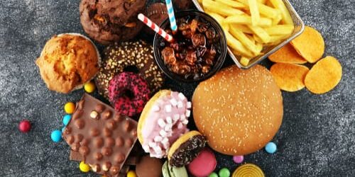a pile of junk food reminds viewers that eating junk food increases your risk of depression