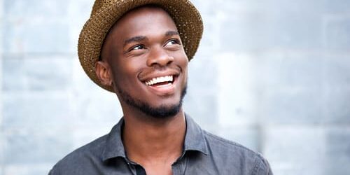 shutterstock_252757909 a man smiles after he remembers the 8 signs of xanax abuse