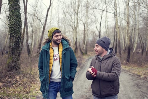shutterstock_589389305 two men talk about ways to deal with loneliness