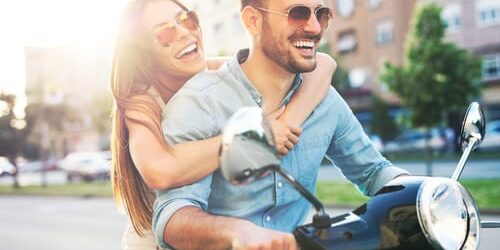 a man and woman ride a moped and ask is addiction different for men and women