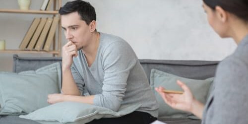 shutterstock_767721010 a therapist talks to a man about why an individualized treatment plan is necessary for addiction recovery