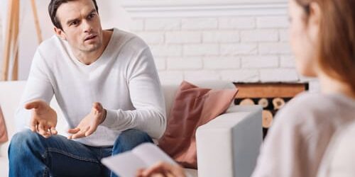 zdgtejs64u A man argues with his therapist about the 4 triggers for bipolar disorder