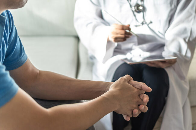 a doctor explaining to the patient what is drug detox