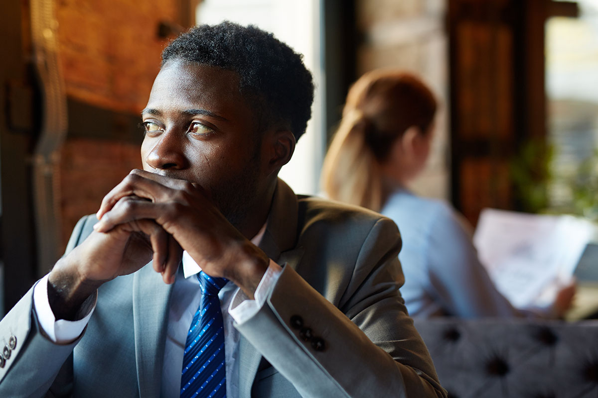 a man getting coffee concerned that he needs Anxiety Treatment