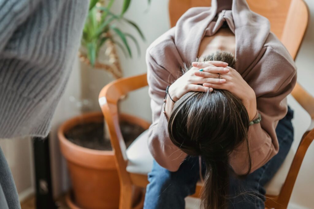 A woman experiencing a panic attack
