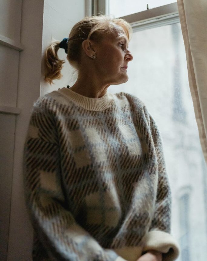 A woman looking out the window
