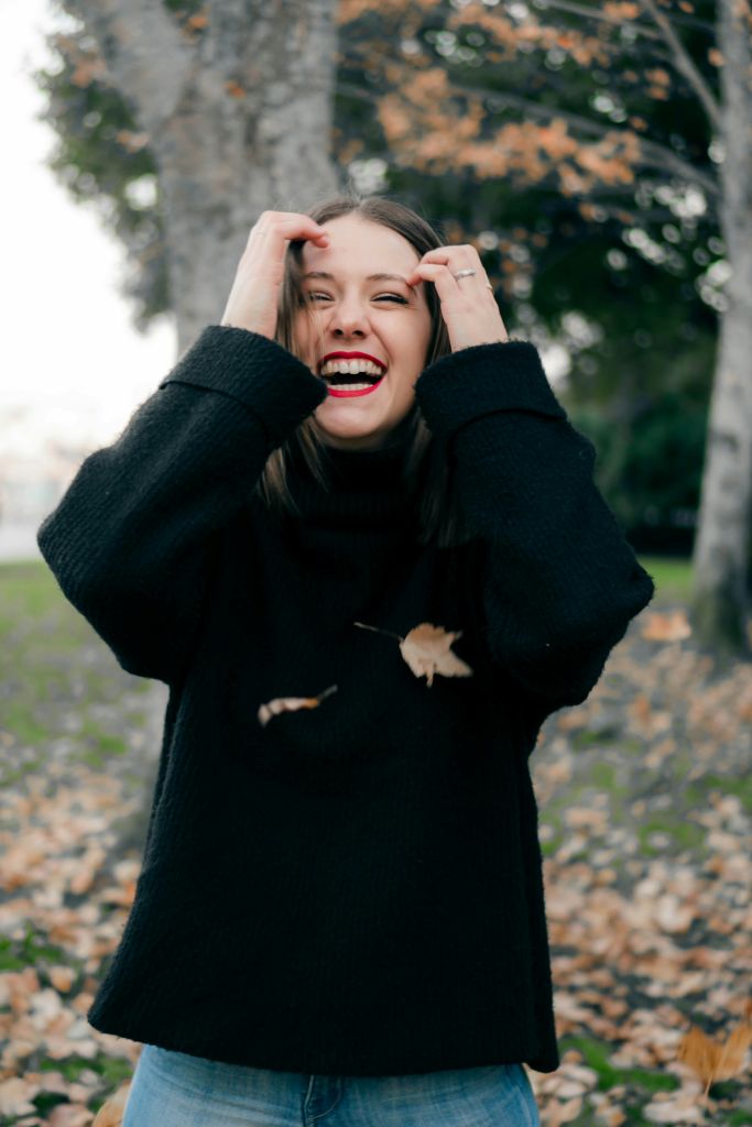 A young woman smiling