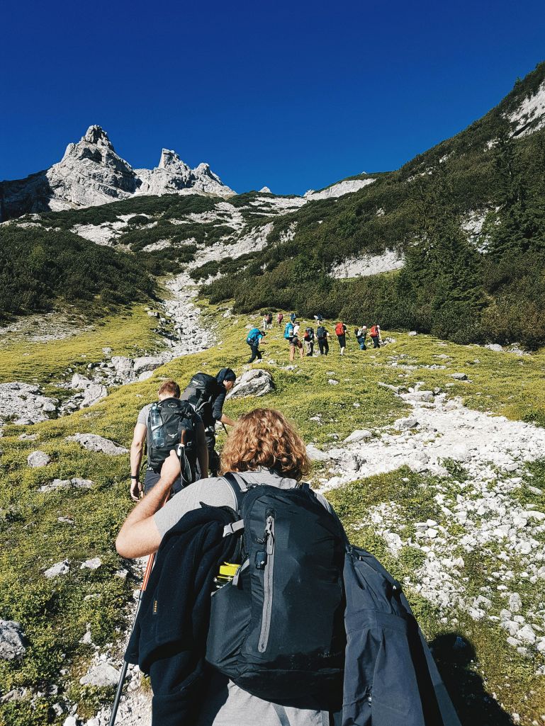 A group hiking up a mountain