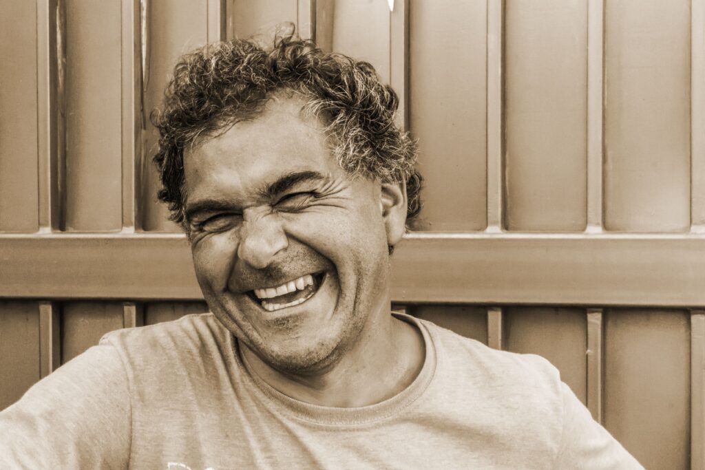 Middle aged man laughing